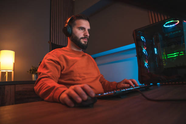 istock Gaming Enthusiast, Man Having a Virtual Adventure 2095232005