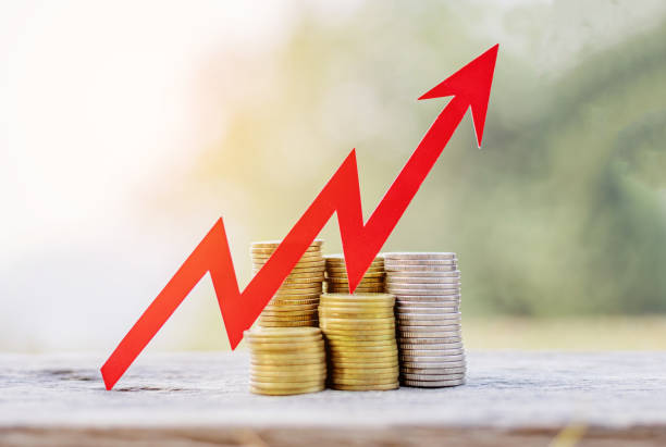 istock upside growing declining arrows graph with coins stack, Asset management.growing money,finance and investment concept 2095240589