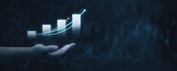 istock hand with a growing graph - concept of strategy and growth in business 2095324189