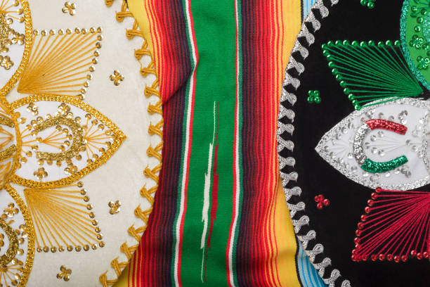 istock Mariachi hat on colorful serape. Mexican sombrero. Cinco de mayo background. 2095400430