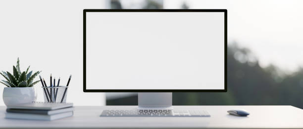 istock A close-up image of a PC computer white-screen mockup and accessories on a white desk 2095460500