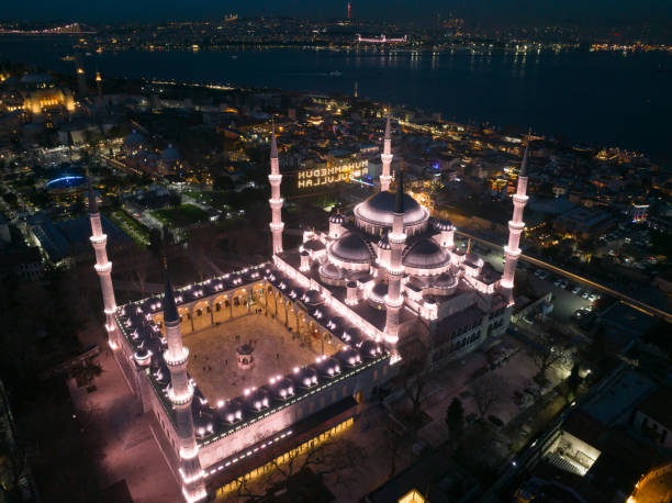istock Blue Mosque (Sultanahmet Camii) Illuminated Letters Between Ramadan Month Minarets (Mahya) Drone Photo, Sultanahmet Square Fatih, Istanbul 2095543587