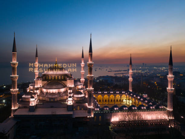 istock Blue Mosque (Sultanahmet Camii) Illuminated Letters Between Ramadan Month Minarets (Mahya) Drone Photo, Sultanahmet Square Fatih, Istanbul 2095544225