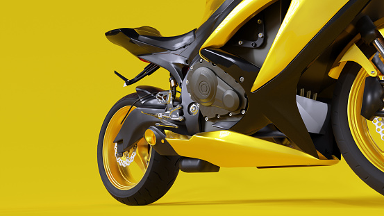 Yellow and black sports motorcycle on a yellow background