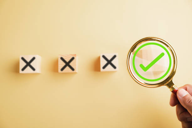 istock magnifying glass enlarges the correct or check mark 2095580097