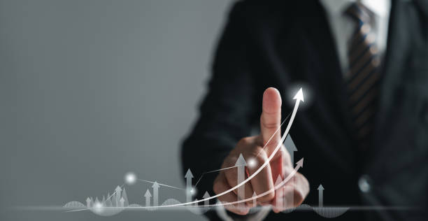 istock Businessman pointing arrow graph growth and financial network connection 2095582242
