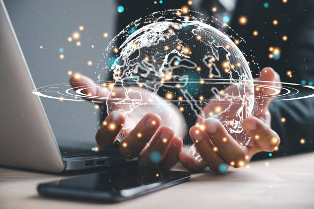 istock businessman holding Global network connection 2095582243