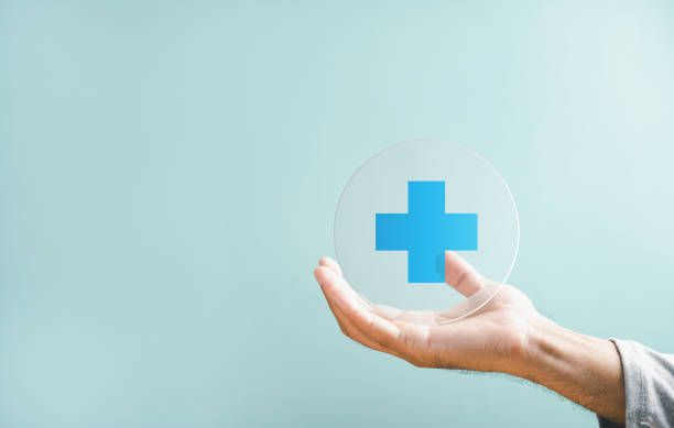 istock Businessman hand holding plus sign virtual 2095582815