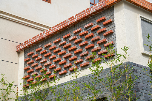Red brick decorative wall on traditional style building in Chinese commercial district