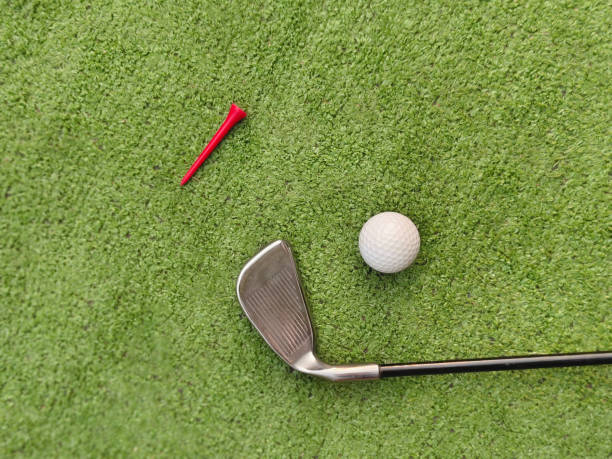 istock Golf equipment on green grass. 2095702350