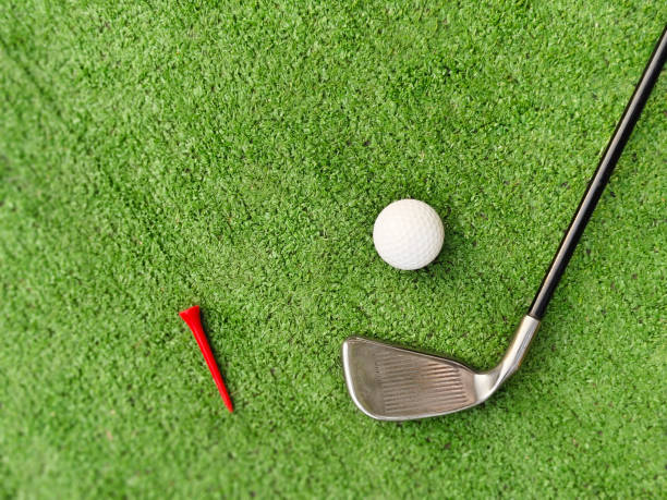 istock Golf equipment on green grass. 2095702352
