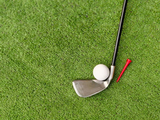istock Golf equipment on green grass. 2095702359