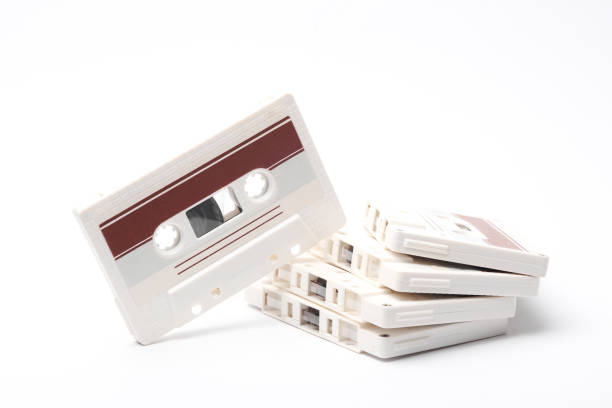 istock Stack of retro 80s audio cassettes on white background 2095712213