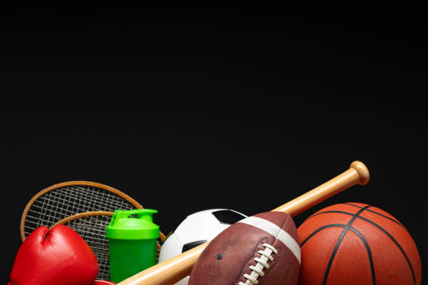 istock Various sports equipment on black background studio shot 2095718014