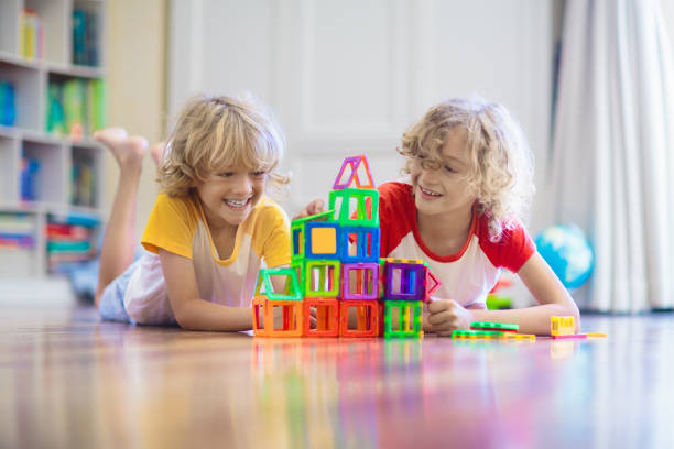 istock Child playing with magnetic building blocks. 2095727009
