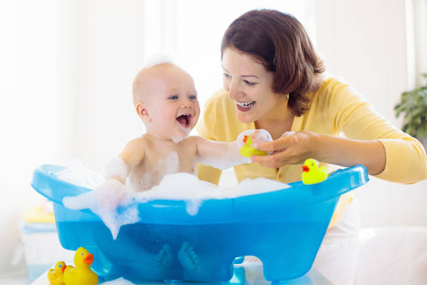 istock Mother and baby in bath 2095741068