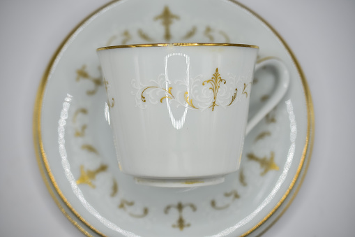 Noritake tea cup and saucer set with delicate gold pattern