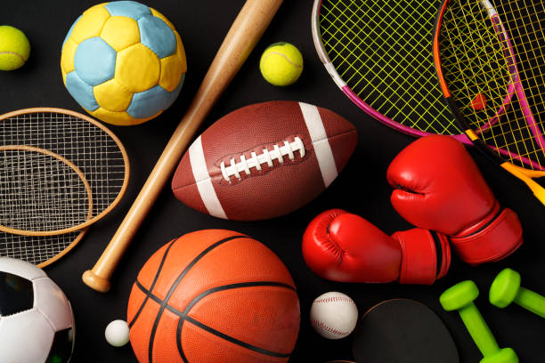 istock Various sports equipment on black background studio shot 2095764536