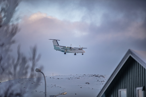 Airplane with winter landscape. Hammerfest - Norway.