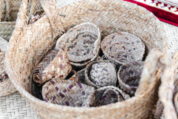 A selection of hand crafted woven bamboo bags, baskets and other craft.