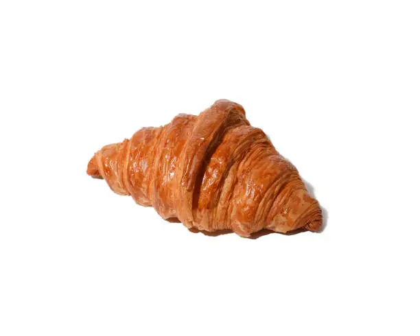 a single croissant on white background