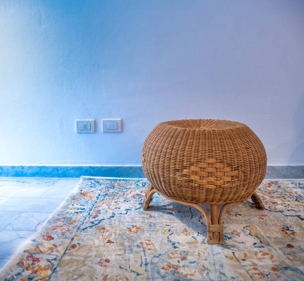 Wooden footrest in a modern apartment.