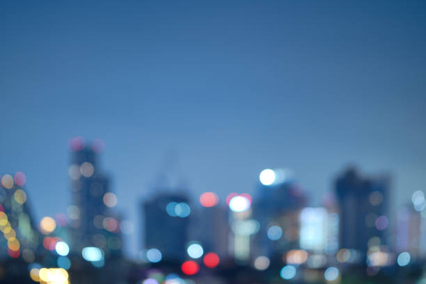 istock Abstract blurred background cityscape on night scene with multicolour bokeh from neon light on building 2095857538
