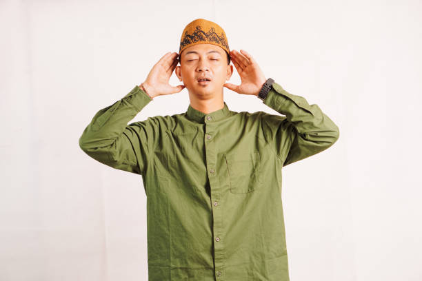 istock Muslim reads in the ear azan 2095927104