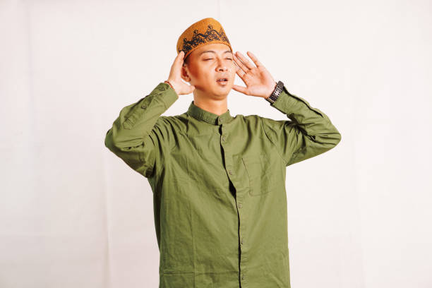 istock Muslim reads in the ear azan 2095927121