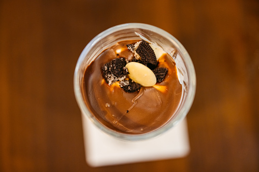 A chocolate dessert on the table in a pub. Close-up.