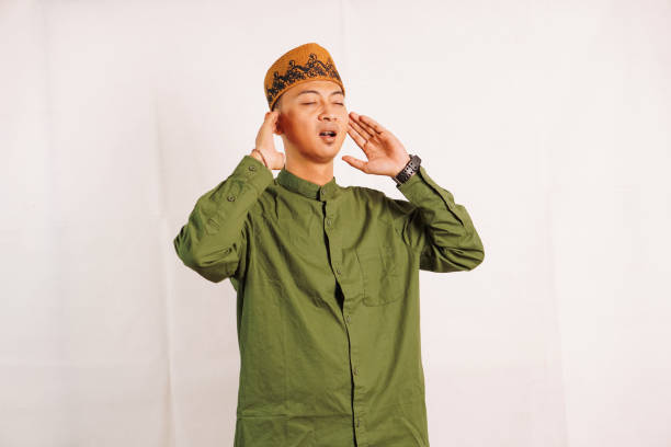 istock Muslim reads in the ear azan 2095930763