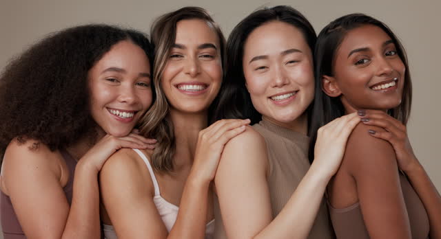 Diversity face, beauty group and happy women with natural cosmetics, facial skincare glow and studio self care. Woman empowerment, makeup and equality portrait of model friends on grey background