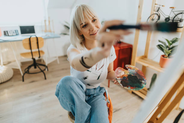 istock Painting is her greatest passion 2095962472