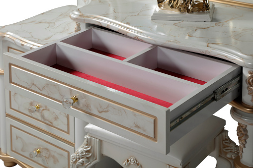 close up open drawer of the dressing table . white background
