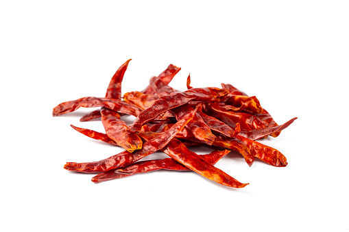 Dried red hot pepper on a white background