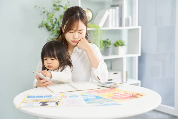 istock A woman choosing lessons for her child 2095989245