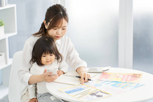 istock A woman choosing lessons for her child 2095989247