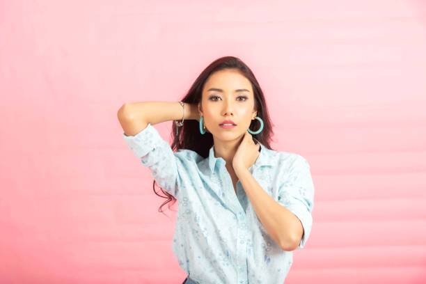 istock Happy young woman view take in studio pink background. 2096009710