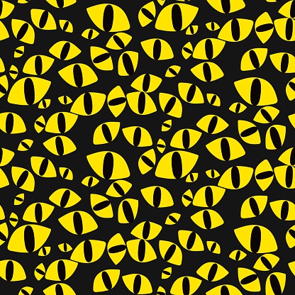 Seamless pattern with cat's yellow eyes on a black background. Bright glowing eyes of cats in the dark. Vector illustration. Pattern for printing on textiles and paper in the theme of halloween.