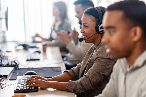 istock Multiethnic group of IT profesionals working togeter using computers in their office 2096037243
