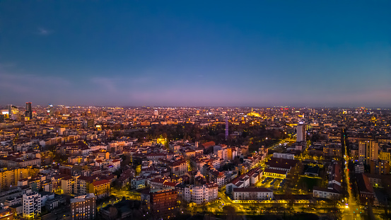 Beautiful panoramic aerial view of Milan city at sunset. Metropolis concept. High quality photo