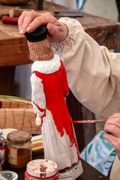 istock Painting on wooden statuette 2096063184