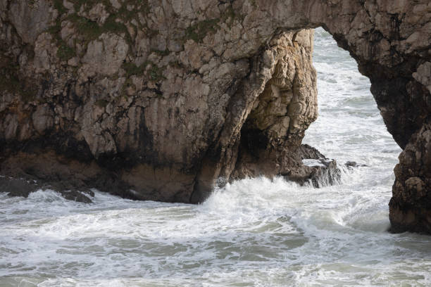 West Lulworth, Dorset, England, United Kingdom - March 1, 2024: Durdle Door in late afternoon sunlight