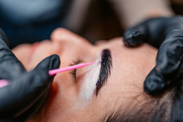 istock Female Beautician Microblading Her Client's Eyebrows At A Beauty Salon 2096071599