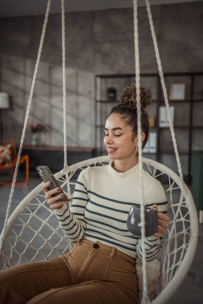 istock A young beautiful woman enjoying her morning coffee 2096076997