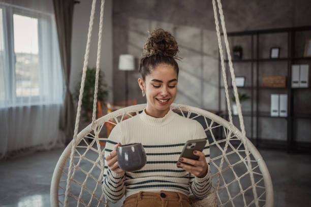 istock A young beautiful woman enjoying her morning coffee 2096081175