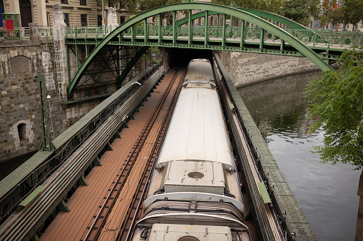 Subway train moving over the railway bridge in Vienna, Austria.