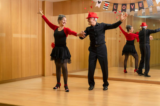 istock senior couple in dance class in studio learning in retiree workshop - new life 2096091271