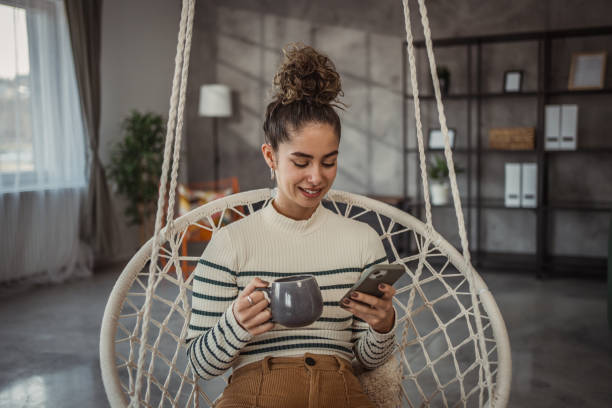 istock A young beautiful woman enjoying her morning coffee 2096094636
