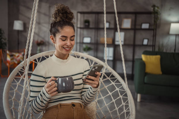 istock A young beautiful woman enjoying her morning coffee 2096094829